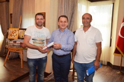 55 ve 61 ada tapuları dağıtılmaya başlandı