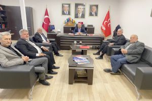 Muhtarlardan MHP İlçe Başkanına ziyaret Muhtarlardan MHP İlçe Başkanına ziyaret