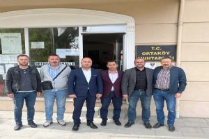 MHP’den Ortaköy Muhtarı Yaman’a ziyaret