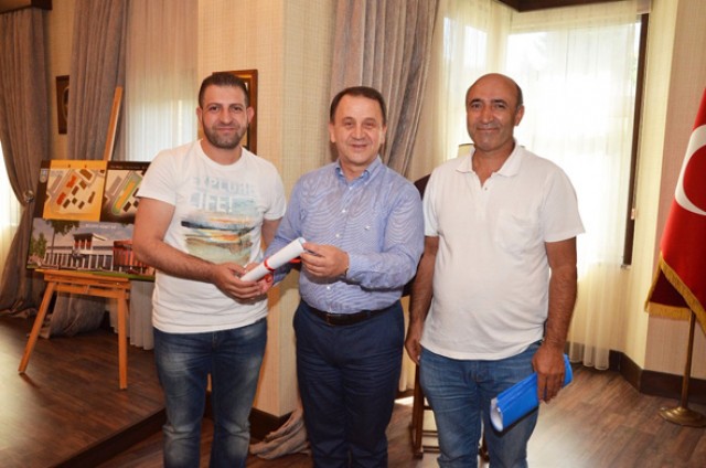 55 ve 61 ada tapuları dağıtılmaya başlandı