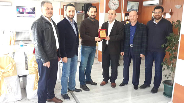 Yunus Emre’den Kutlu’ya plaket